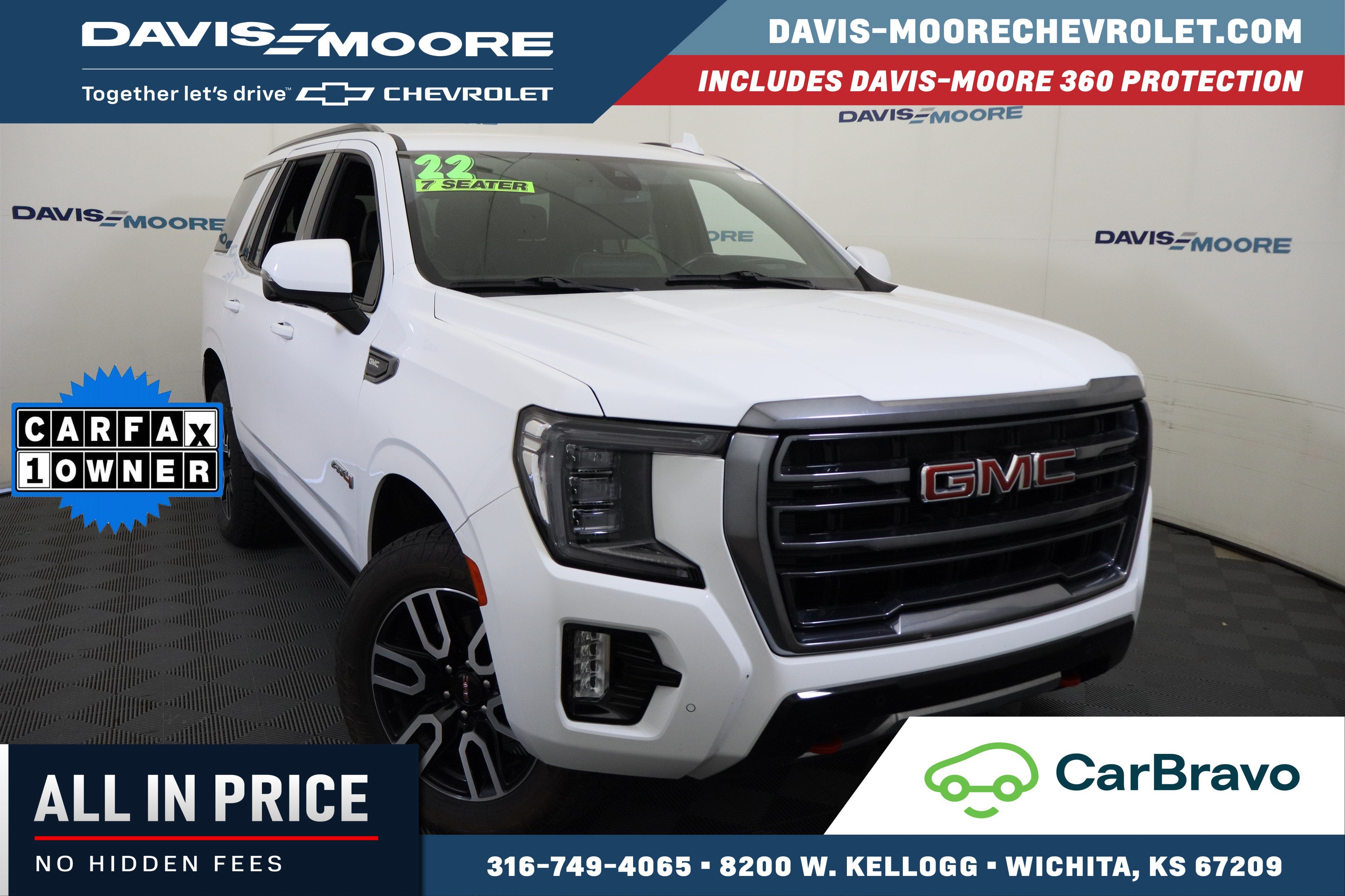 2022 GMC Yukon AT4 in Summit White — front three-quarter view