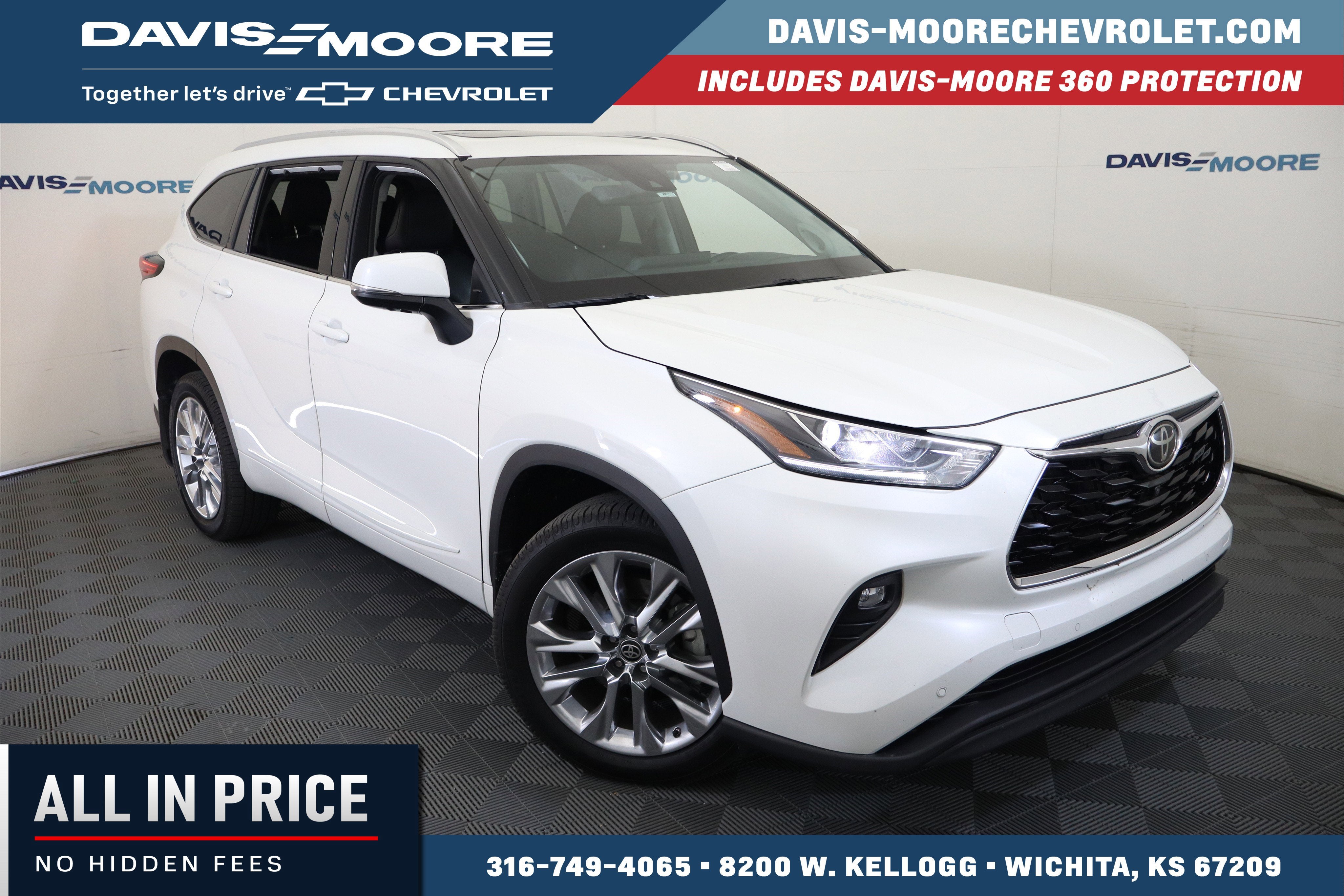 2021 Toyota Highlander Limited in White — front three-quarter view